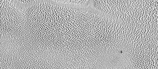 Illustration for article titled NASA’s New Photos Bring Pluto’s Surface Into Sharp Focus